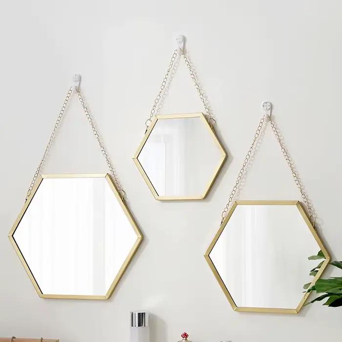 Miroir mural hexagonal en fer