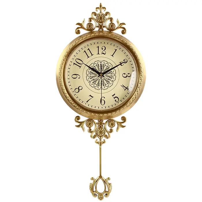 Horloge murale de salon en métal et laiton