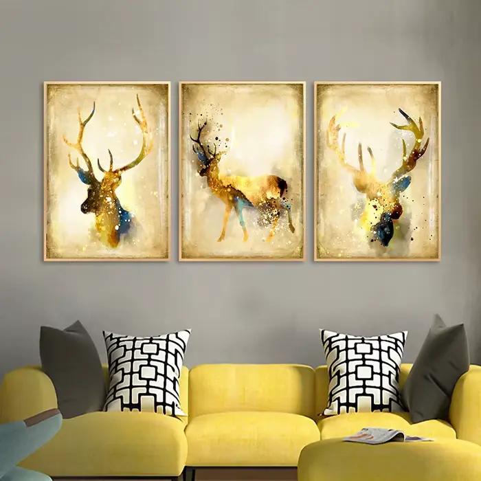 Toile de peinture moderne en forme de cerf et d'élan jaune