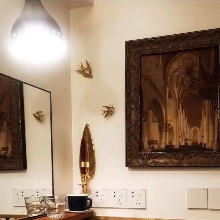 Pendentif mural en forme d'hirondelle