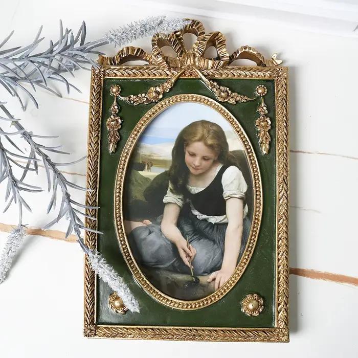 Cadre photo sculpté doré