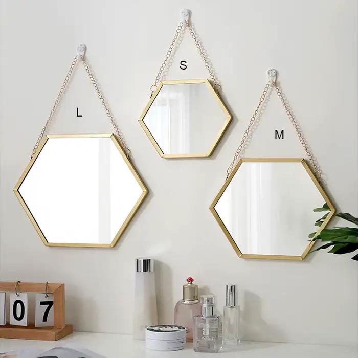 Miroir mural hexagonal en fer