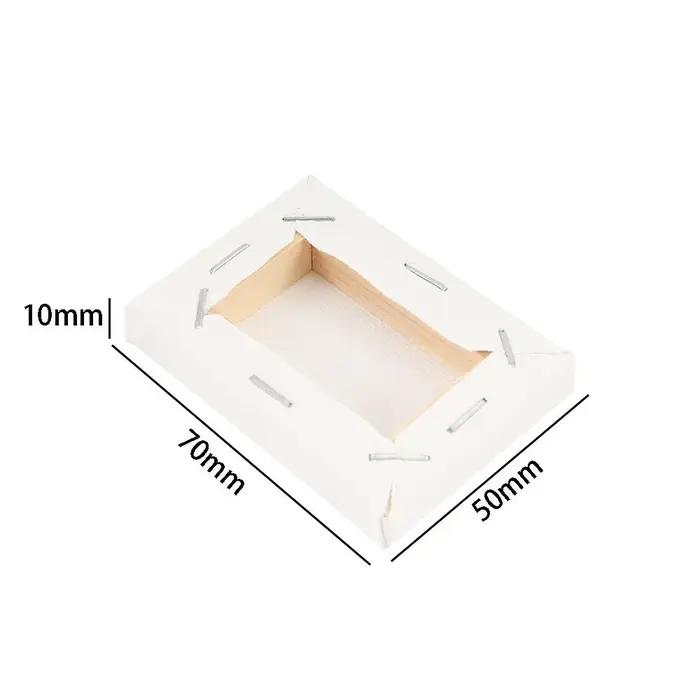 Petit cadre en bois blanc pour toile d'artiste