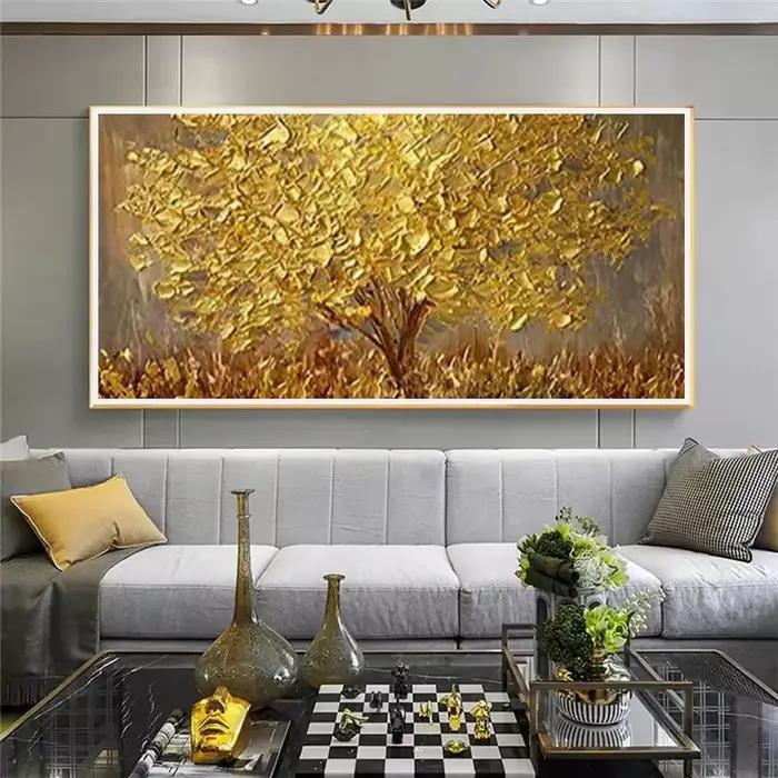 Peinture sur toile de feuilles dorées et d'arbres dorés