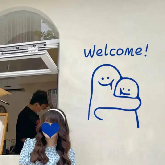 Autocollant de bienvenue simple INS pour porte