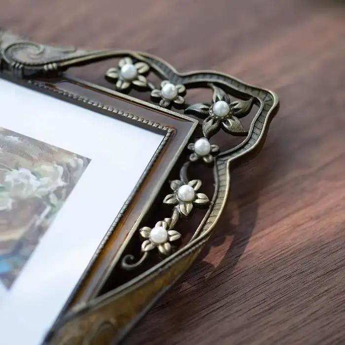 Cadre photo en métal avec perle de diamant