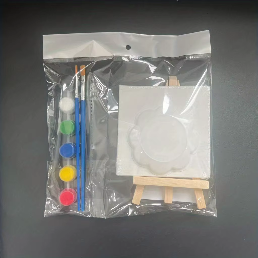 1 kit de peinture, 1 planche à dessin, 1 chevalet, 2 stylos, 6 couleurs de peinture, 1 palette, mini